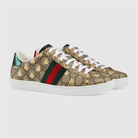 Sneaker Gucci Ace donna in tessuto GG Supreme con api